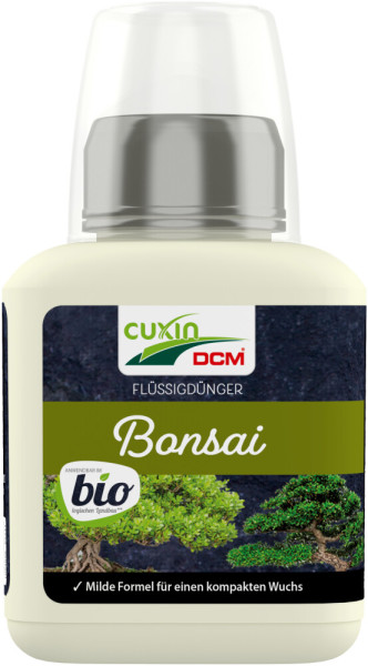 Produktbild von Cuxin DCM Flüssigdünger für Bonsai BIO in einer 0,25-Liter-Flasche mit Beschriftung und Abbildung eines Bonsaibaums darauf