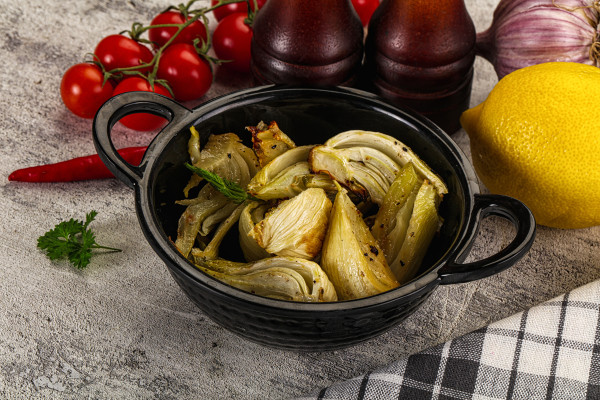 large-a-bowl-of-vegetables-and-a-lemon-on-a-table