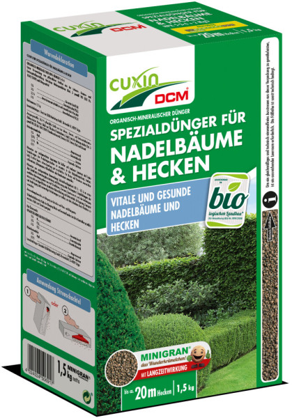 Produktbild von Cuxin DCM Spezialdünger für Nadelbäume und Hecken in einer grünen 1, 5, kg Streuschachtel mit Produktbeschreibungen und Anwendungshinweisen.