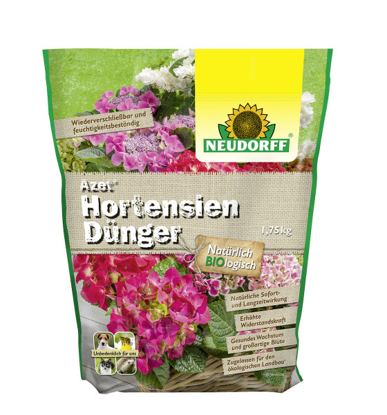 Produktbild von Neudorff Azet HortensienDünger Verpackung mit verschiedenen Hortensienblüten und Produktinformationen in grün und gelb.