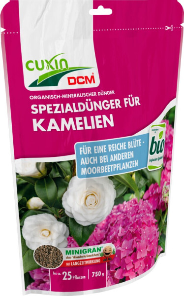 Produktbild von Cuxin DCM Spezialdünger für Kamelien Minigran Verpackung mit Informationen zur organisch-mineralischen Zusammensetzung und Anwendungsempfehlungen auf Deutsch.