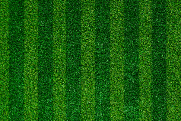large-abstract-green-grass-football-field-of-artificial-grass-background-texture-top-view
